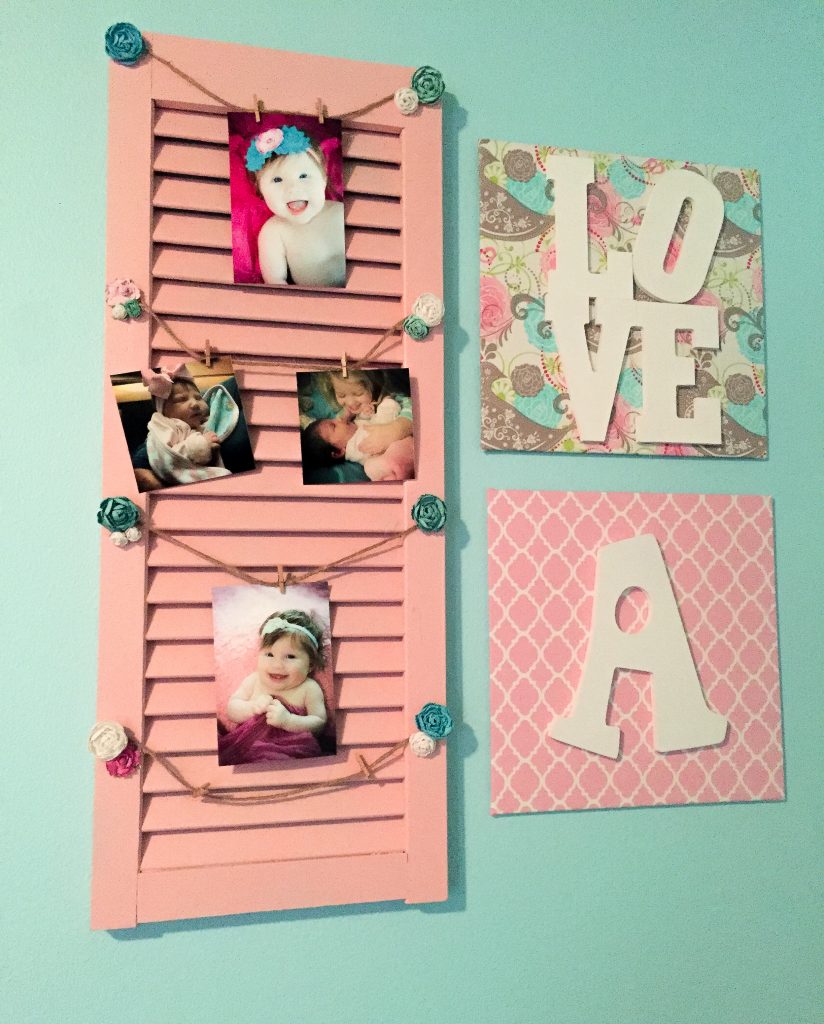 Aqua and pink nursery. Aqua and pink nursery decor with bird accents. Nursery storage solutions.
