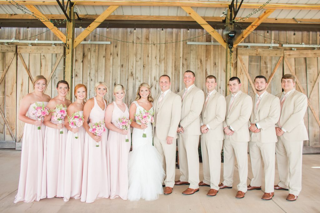 Rustic barn wedding meets vintage fairy tale. Meadow Creek Farm North Alabama wedding venue. Vintage Beauty and the Beast inspired wedding reception decoration ideas. Lace, mermaid style wedding gown. Half up curly bridal hair with braids. 