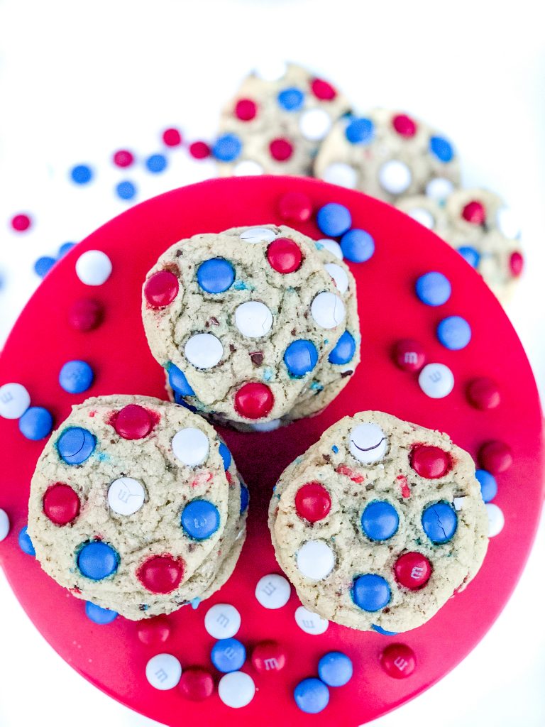 The BEST M&M cookie recipe. Red, white and blue M&M cookies. Modify this cookie recipe for any holiday. Holiday M&M cookie recipe