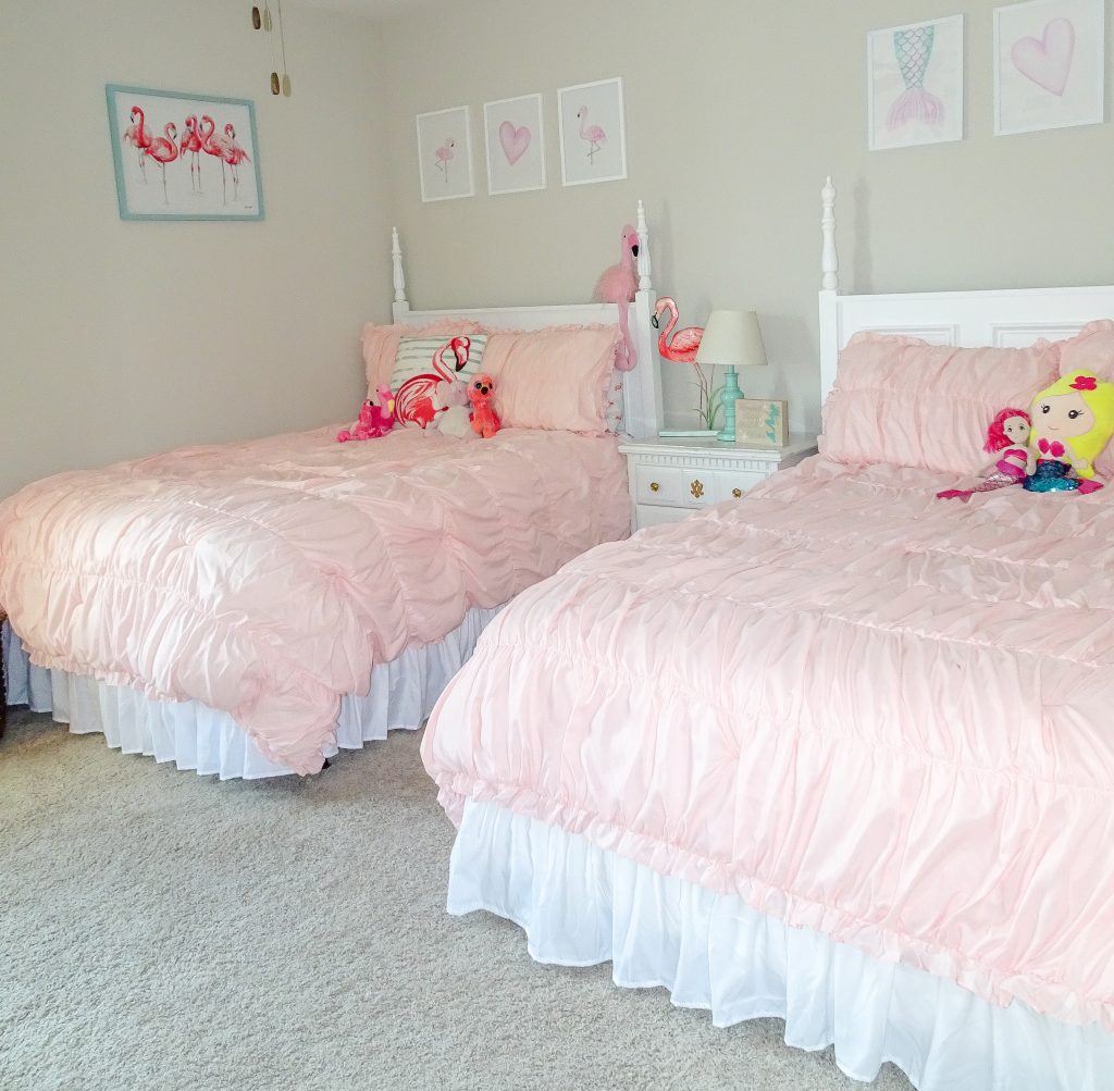 Mermaid and flamingo shared girls' bedroom. Flamingo and mermaid bedroom decor. Flamingo bedroom decor. Mermaid bedroom decor. Shared bedroom organization . Sibling shared bedroom.