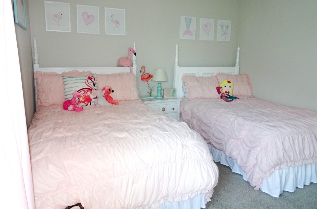 Mermaid and flamingo shared girls' bedroom. Flamingo and mermaid bedroom decor. Flamingo bedroom decor. Mermaid bedroom decor. Shared bedroom organization . Sibling shared bedroom.
